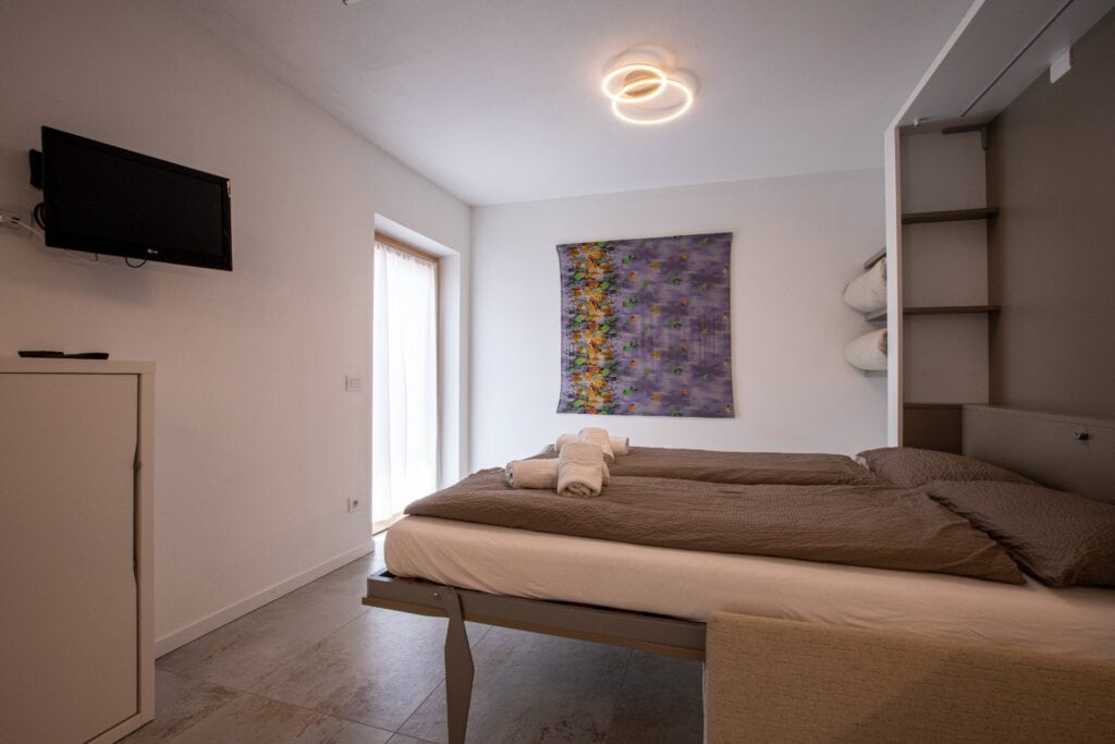 Zona notte letto matrimoniale appartamento 2 chalet sebastian livigno