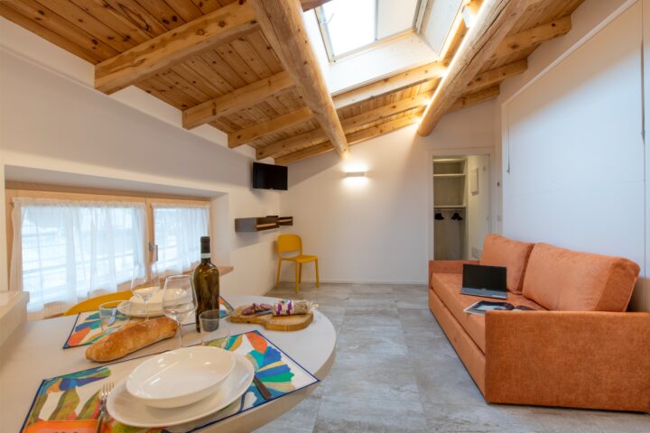 Soggiorno sala da pranzo open space appartamento 3 chalet sebastian livigno